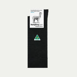 Black sock with Humphrey Law label on a white background