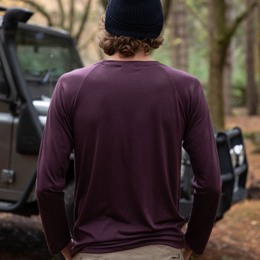 Men’s Tasmanian Merino 180 Raglan Long Sleeve Top viewed from the back. Showing the classic Raglan sleeves that extend all the way to the collar and neckline. The sleeves of this raglan tee are the same colour as the rest of the top - Photography by Melanie Kate Creative -  © Bluey Merino
