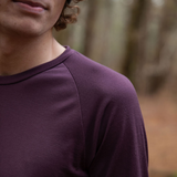 Men’s Tasmanian Merino 180 Raglan Long Sleeve Top. Up close view of the classic Raglan shoulder details that extend all the way to the collar and neckline. This Raglan top has the classic cut of a Raglan but is made with one colour - Photography by Melanie Kate Creative - © Bluey Merino