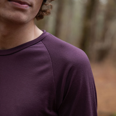 Men’s Tasmanian Merino 180 Raglan Long Sleeve Top. Up close view of the classic Raglan shoulder details that extend all the way to the collar and neckline. This Raglan top has the classic cut of a Raglan but is made with one colour - Photography by Melanie Kate Creative - © Bluey Merino