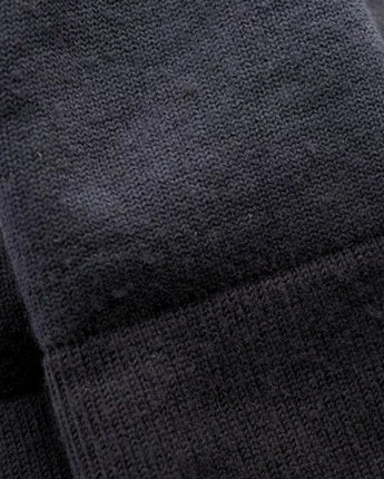 Close-up of Black wool winter sports socks © Humphrey Law