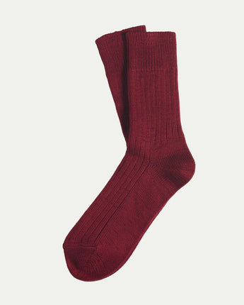 Luxurious, comfy Tasmanian Merino Base socks displayed flat lay on a white background, highlighting their soft texture and premium quality. © Bluey Merino Tasmania