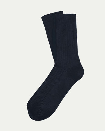 Luxurious, comfy Tasmanian Merino Base socks displayed flat lay on a white background, highlighting their soft texture and premium quality. © Bluey Merino Tasmania
