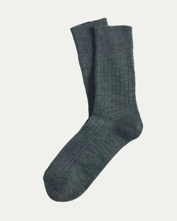 Luxurious, comfy Tasmanian Merino Base socks displayed flat lay on a white background, highlighting their soft texture and premium quality. © Bluey Merino Tasmania