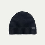 Fisherman knit Merino Black beanie with a brand label on a light grey background © Bluey Merino Tasmania