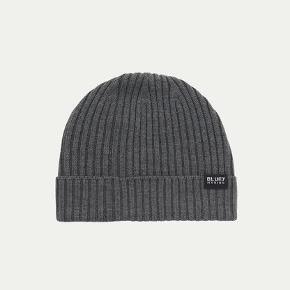 Fisherman knit grey Merino beanie with a brand label © Bluey Merino Tasmania