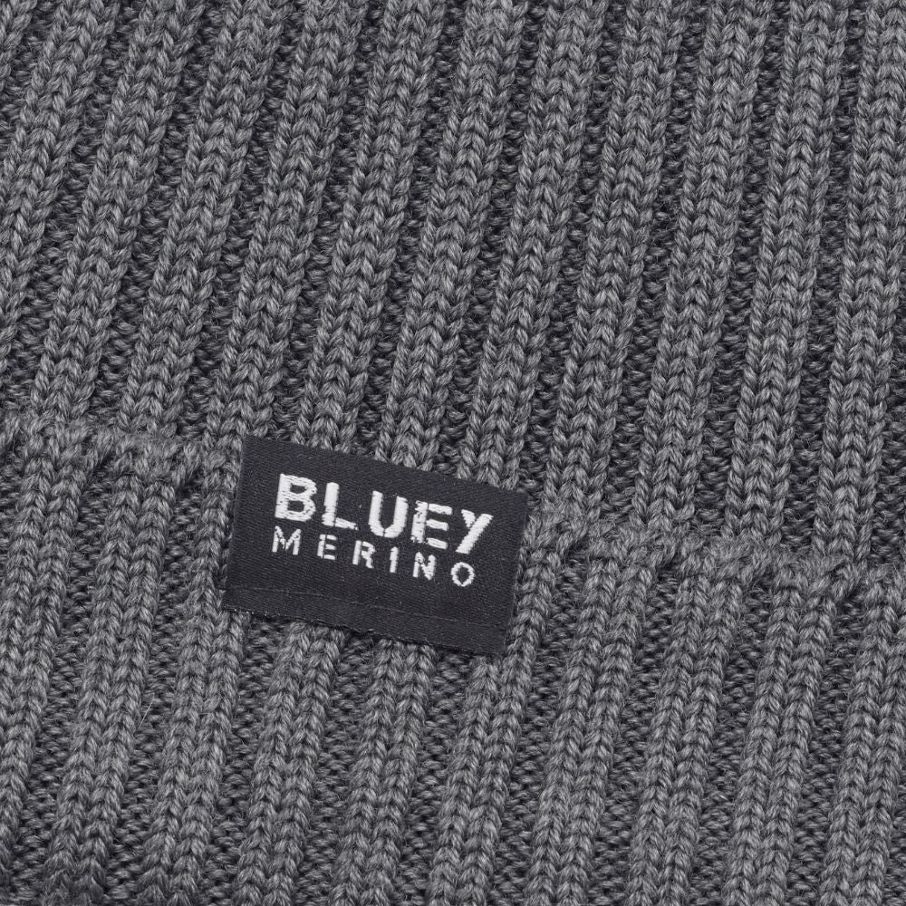 Up close Fisherman knit grey Merino beanie with a brand label © Bluey Merino Tasmania