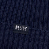 Up close - Fisherman knit Navy blue Merino beanie with a brand logo  © Bluey merino Tasmania