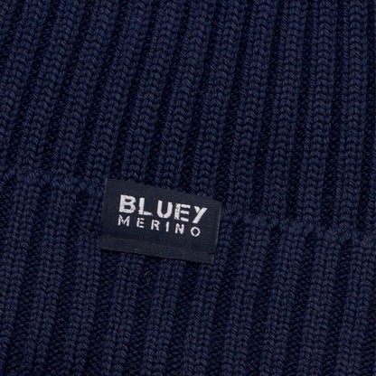 Up close - Fisherman knit Navy blue Merino beanie with a brand logo  © Bluey merino Tasmania