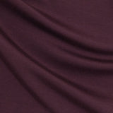 Close-up of maroon fabric with folds