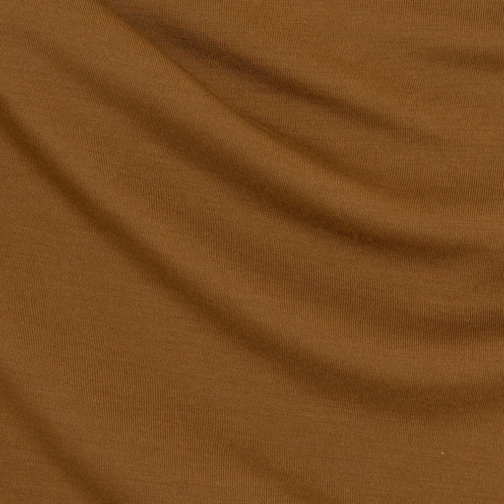 Close-up of bronze fabric with visible texture
