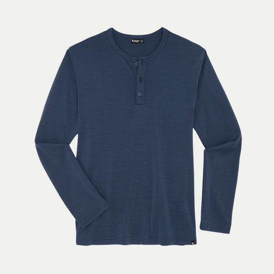 Blue long-sleeve henley shirt on a light gray background