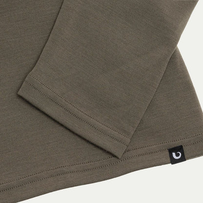 Sage green fabric with a visible brand logo on a white background