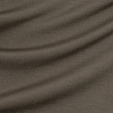 Close-up of sage green fabric with visible texture