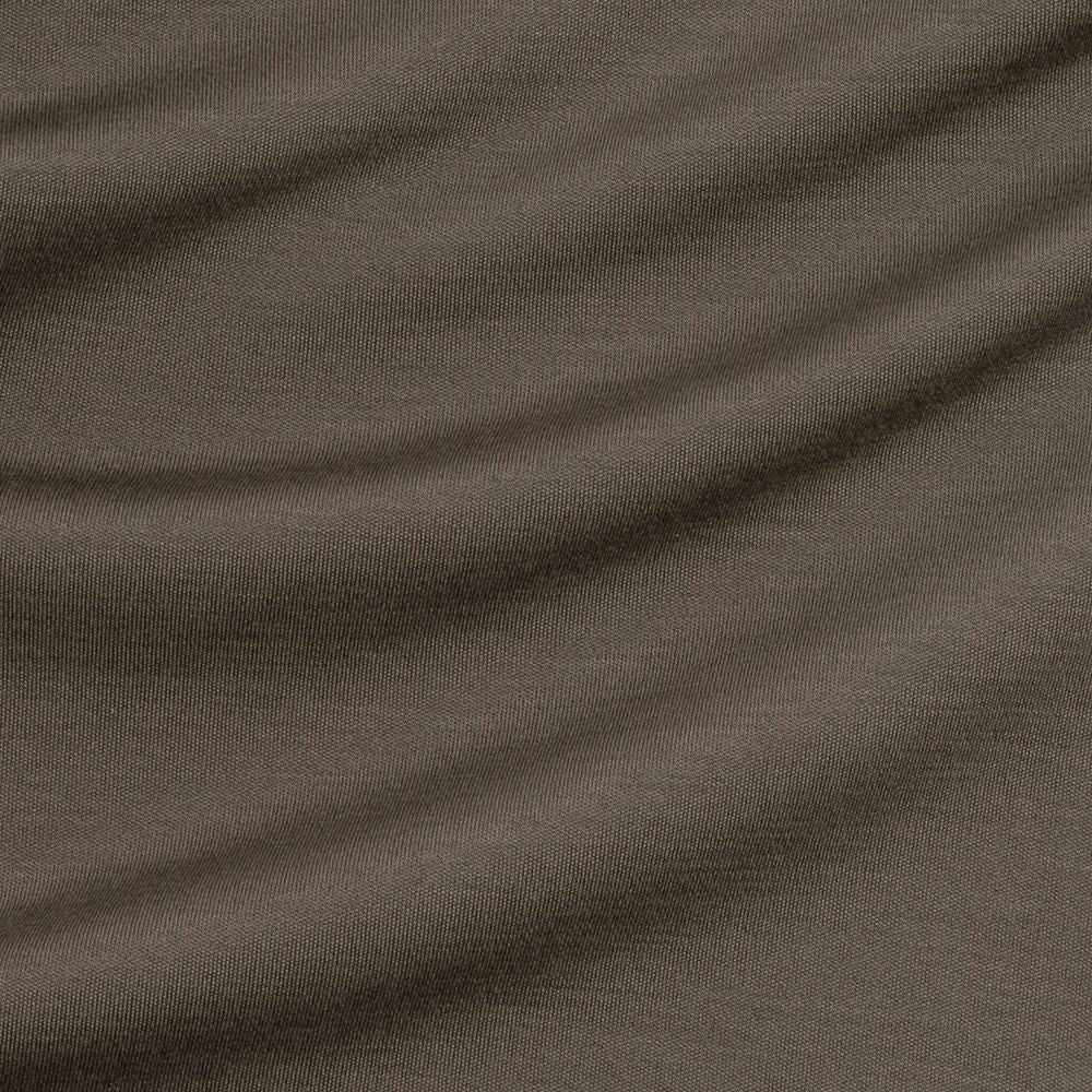 Close-up of sage green fabric with visible texture