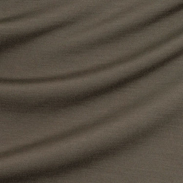 Close-up of sage green fabric with visible texture
