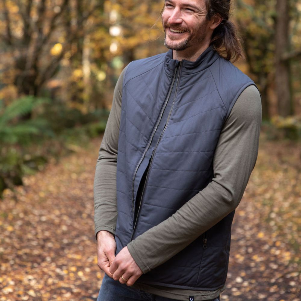 Man wearing a Merino quilted gilet vest in northern Tasmanian wilderness © Bluey Merino Tasmania