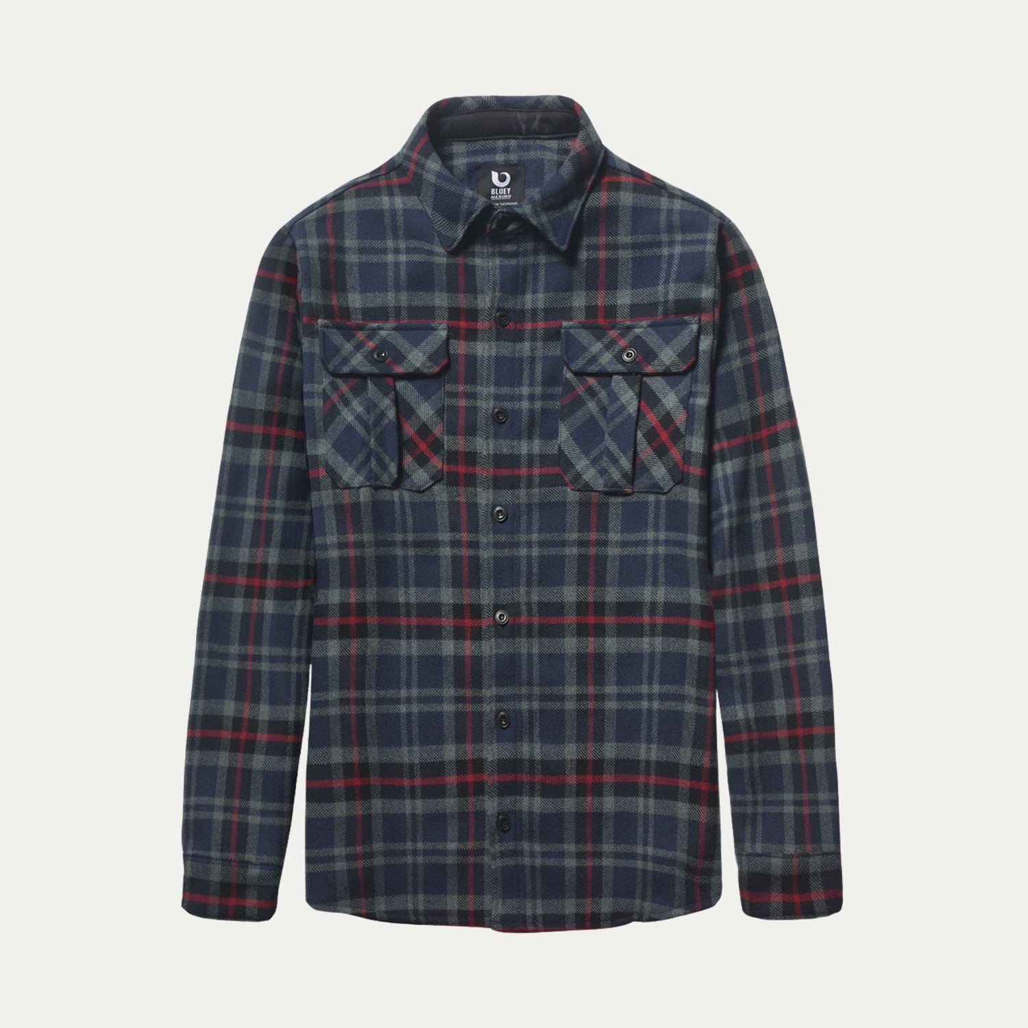 Plaid shirt with two front pockets on a white background