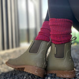 closeup on feet wearing Merry people boots, pink and red thick Merino boot socks © Bluey Merino Tasmania