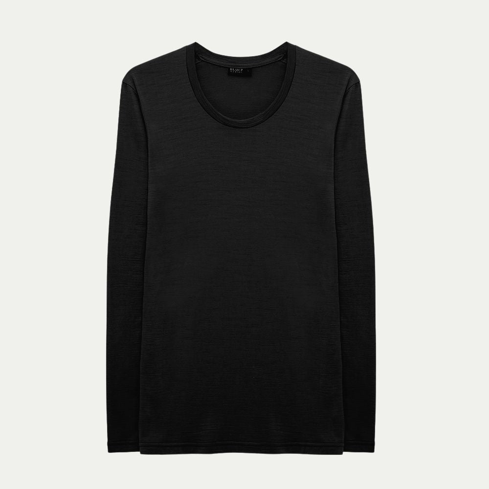 Black Merino long-sleeve base layer on a light grey background © Bluey Merino Tasmania