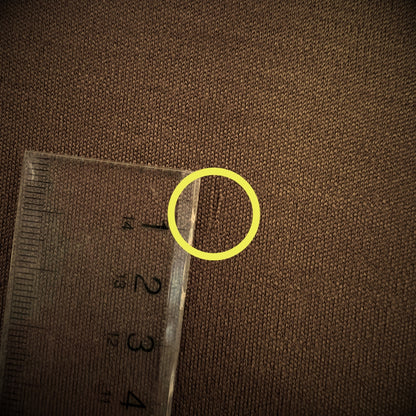 Close up detail to fabric defect - factory second Men's Henley in Chestnut © Bluey Merino Tasmania.